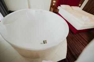 Łazienka w obiekcie Noclegi - Apartamenty Żołynianka