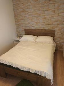 Кровать или кровати в номере Apartment Maro