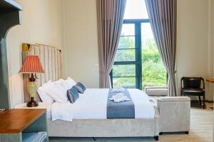 Phuping Valley Resort客房内的一张或多张床位