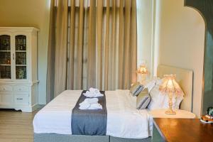 Phuping Valley Resort客房内的一张或多张床位