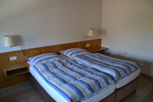 Postel nebo postele na pokoji v ubytování Haus Widder Nr1