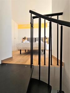 Posteľ alebo postele v izbe v ubytovaní Planeta Cádiz Apartaments