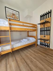 Posteľ alebo postele v izbe v ubytovaní Planeta Cádiz Apartaments