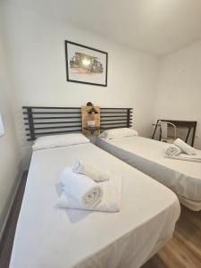 Posteľ alebo postele v izbe v ubytovaní Planeta Cádiz Apartaments