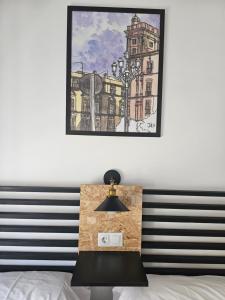 Posteľ alebo postele v izbe v ubytovaní Planeta Cádiz Apartaments