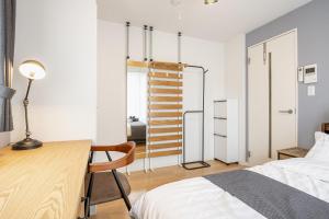 Ein Bett oder Betten in einem Zimmer der Unterkunft Felice Nishi-Shinjuku