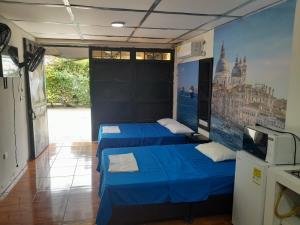 TV a/nebo společenská místnost v ubytování Apartamento Encanto + 13 fotografií