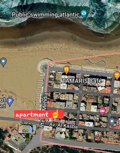 um mapa de um resort numa praia em Cammar Appartement em Kenitra