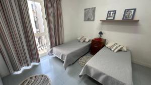 Postel nebo postele na pokoji v ubytování Malta Crown guesthouse