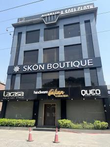 a building with a sign for a ski boutique at Skon Boutique by Orion Hotels in New Delhi