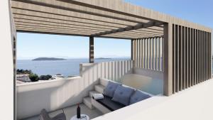 Een balkon of terras bij Poseidon Villas