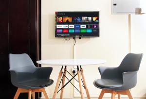TV a/nebo společenská místnost v ubytování Al BARAKAH HOTEL