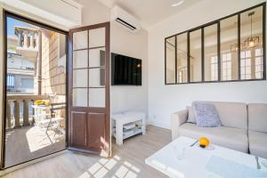 TV a/nebo společenská místnost v ubytování Palais Biagini - Happy Rentals