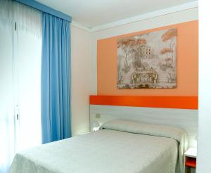 Postel nebo postele na pokoji v ubytování Hotel The Marquee