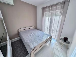 Postel nebo postele na pokoji v ubytování Gemini Apart