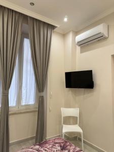 TV a/nebo společenská místnost v ubytování Toledo Relax