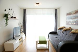 Posezení v ubytování Modern Danube Apartment Vienna