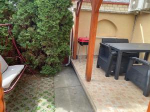 Patio alebo iná vonkajšia časť ubytovania Csillám vendégház
