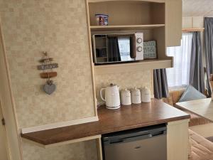 Fotografie z fotogalerie ubytování Caravan Sleeps 4 with Free Parking v destinaci Burnham-on-Sea