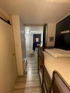 Giường trong phòng chung tại L'écume de Pentrez