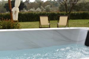 Imagem da galeria de Anemi Superior Deluxe Suite em Kolios mais 41 fotografias