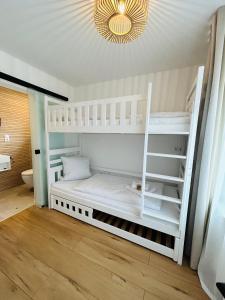 Postel nebo postele na pokoji v ubytování STRANDHUUS Norddeich