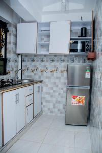 Kuchyň nebo kuchyňský kout v ubytování Shanny's 1Bedroom