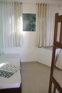 Hostel Vista do Mar客房内的一张或多张床位