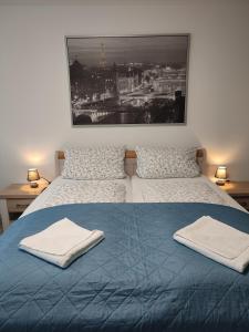 מיטה או מיטות בחדר ב-A&M LivinG