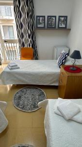 Postel nebo postele na pokoji v ubytování Malta Crown guesthouse