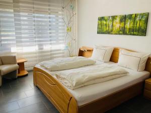 Postel nebo postele na pokoji v ubytování Ferienwohnung Raevenhof