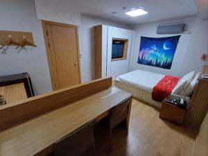 Residence Yeoyu客房内的一张或多张床位