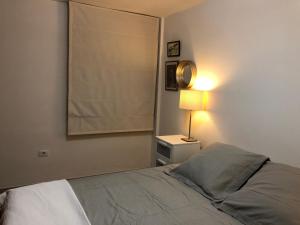 Кровать или кровати в номере Apartment by the sea El Medano Royal Plaza