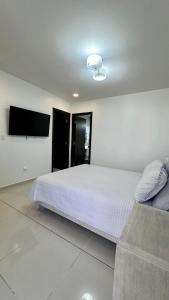 Uma cama ou camas num quarto em Stylish Condo In Tribeca