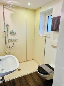 Kúpeľňa v ubytovaní Hotel Sonnenhof - bed & breakfast & appartements