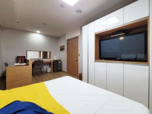 Residence Yeoyu客房内的一张或多张床位