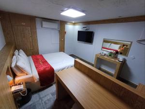 Residence Yeoyu客房内的一张或多张床位