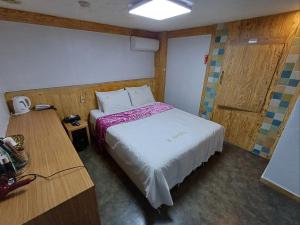 Residence Yeoyu客房内的一张或多张床位