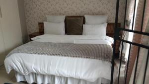 Кровать или кровати в номере 221 Guesthouse