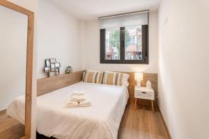 Ένα ή περισσότερα κρεβάτια σε δωμάτιο στο OK home.