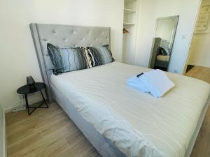 Кровать или кровати в номере Appart spacieux - Porte Italie - Créteil 8 pers