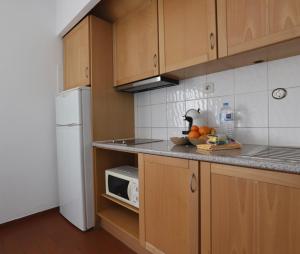 A cozinha ou kitchenette de Apartamento Brisa Mar