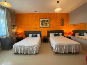 Uma cama ou camas num quarto em Suite Apart Miraflores