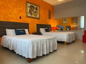 Uma cama ou camas num quarto em Suite Apart Miraflores