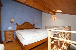 A bed or beds in a room at Albergo Ristorante della Posta