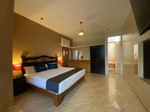 Uma cama ou camas num quarto em Suite Apart Miraflores