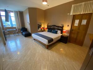 Uma cama ou camas num quarto em Suite Apart Miraflores
