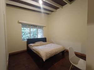 Postel nebo postele na pokoji v ubytování Mad Vervet Nairobi Backpackers Hostel