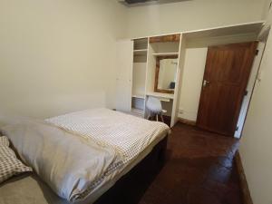 Postel nebo postele na pokoji v ubytování Mad Vervet Nairobi Backpackers Hostel