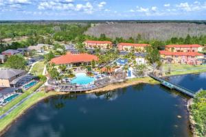 an aerial view of a resort with a pool at 4 Bedrooms 3 Bathrooms Terra Verde 4746 Vb in Kissimmee